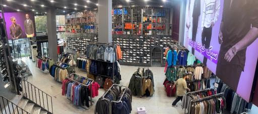 عکس فروشگاه کفش و لباس کوئلی شاپ