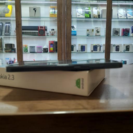 عکس فروشگاه و خدمات موبایل تاج موبایل