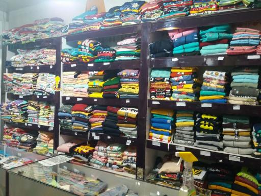 عکس فروشگاه لباس کودک بچه شیک