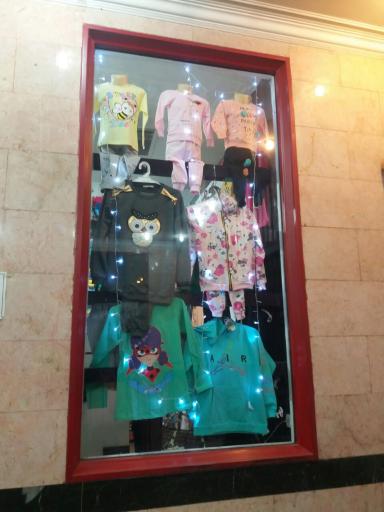 عکس فروشگاه لباس کودک بچه شیک