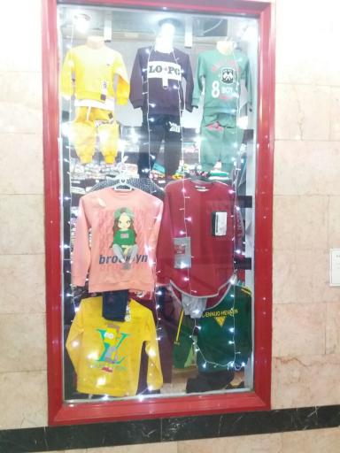 عکس فروشگاه لباس کودک بچه شیک