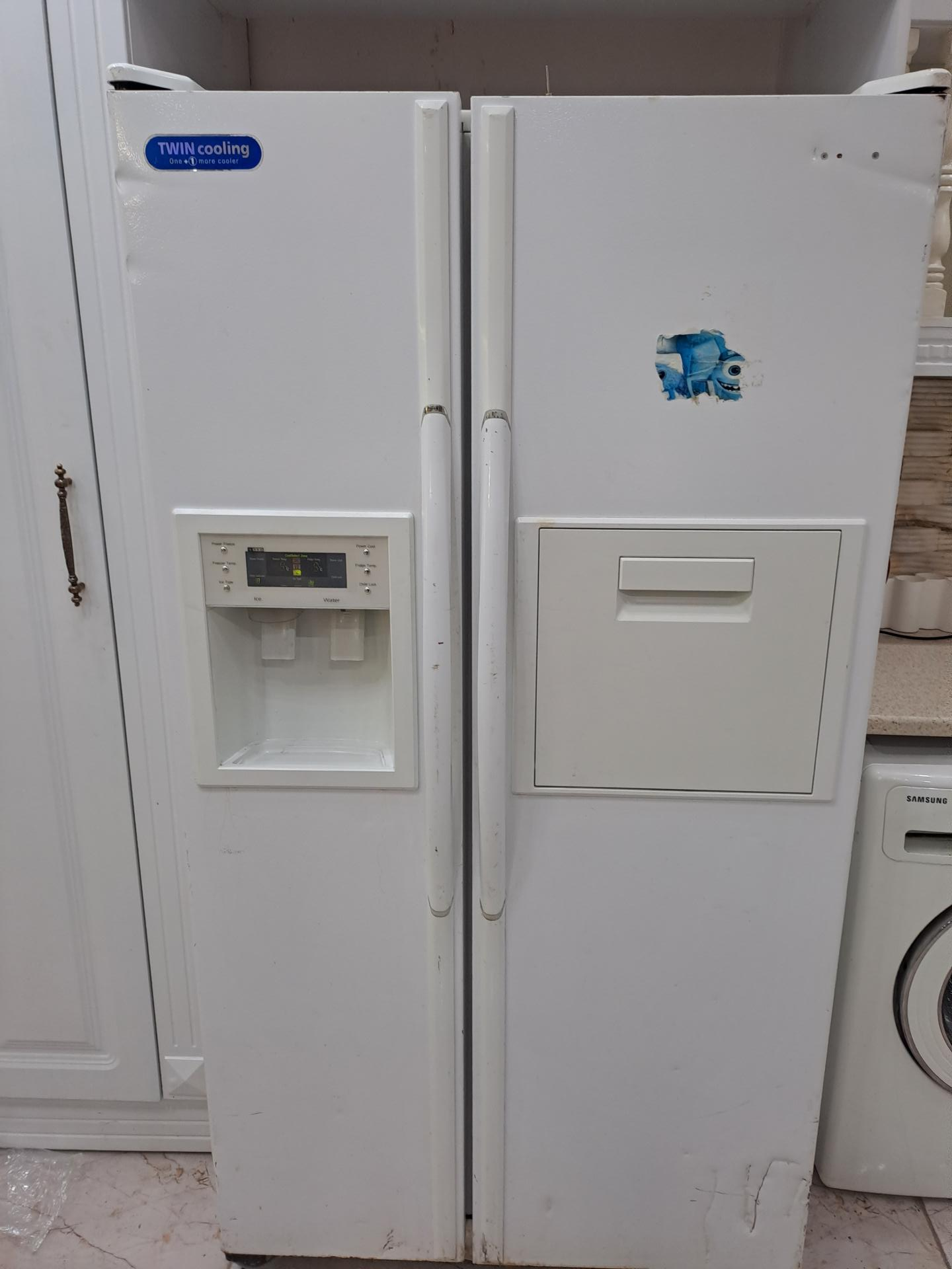 عکس تعمیر یخچال و لباسشویی قهرمانی