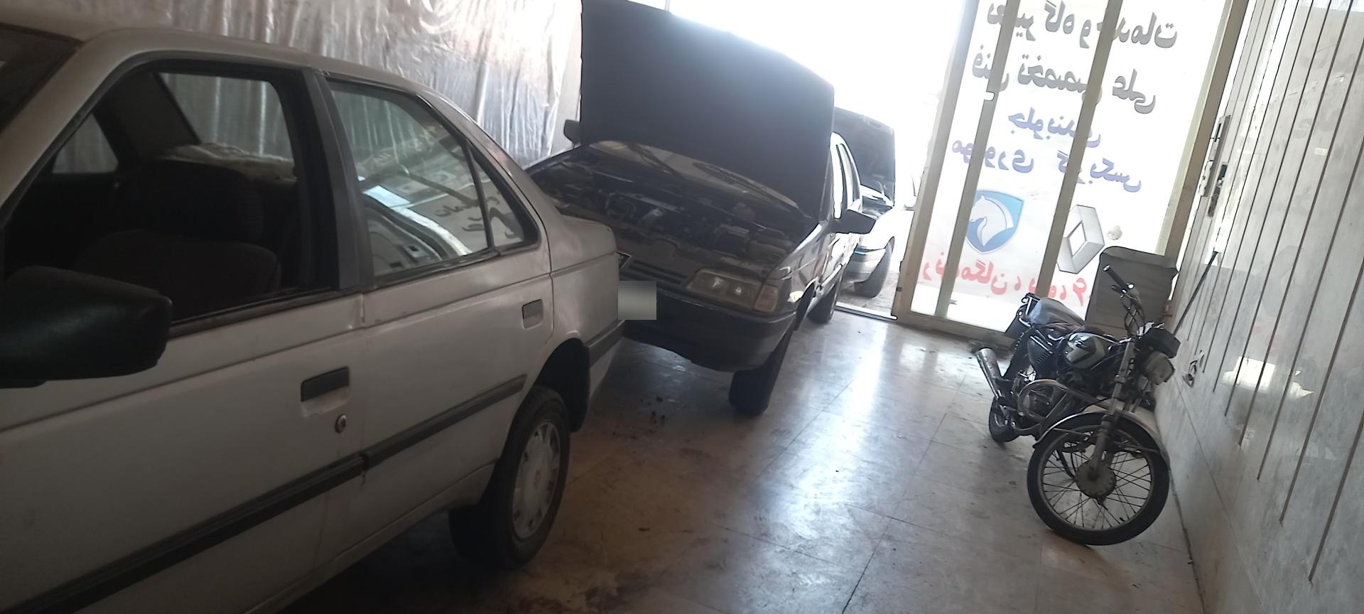 عکس تعمیرگاه علی