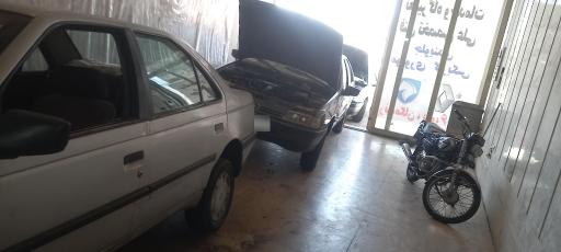 عکس تعمیرگاه علی