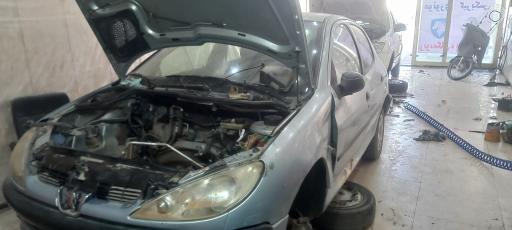 عکس تعمیرگاه علی