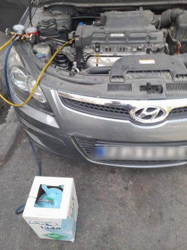 عکس باطری سازی و شارژ گاز کولر داور