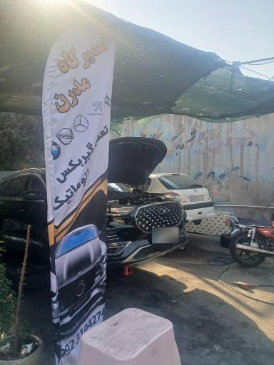 عکس تعمیرگاه مدرن تعمیرات انواع ماشین خارجی