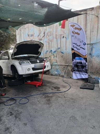 عکس تعمیرگاه مدرن تعمیرات انواع ماشین خارجی