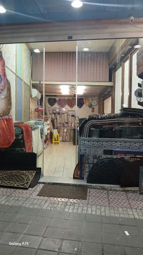 عکس فروشگاه کاغذ دیواری اکسین