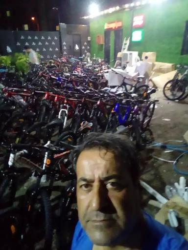 عکس تعمیر چتر و دوچرخه محبوبی